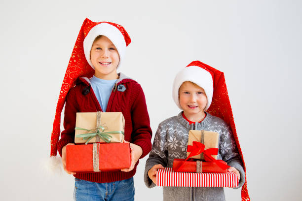 istock Kids celebrating christmas 884775744
