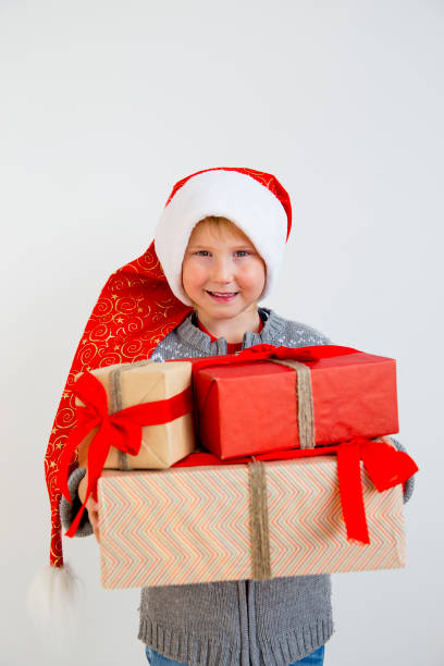 istock Kids celebrating christmas 884785304