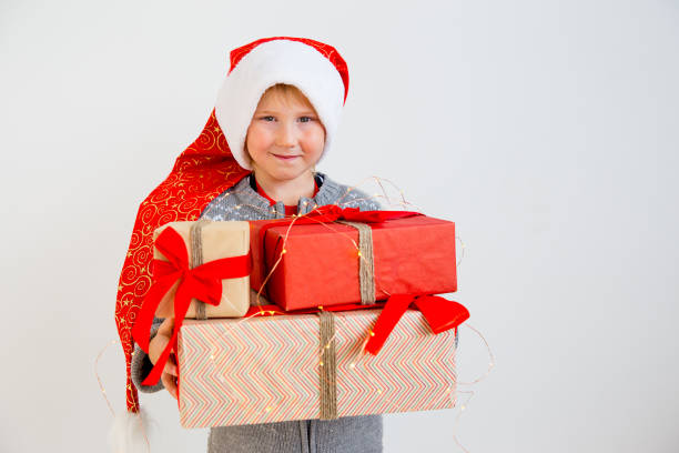 istock Kids celebrating christmas 884789678