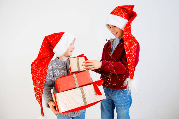 istock Kids celebrating christmas 884792490