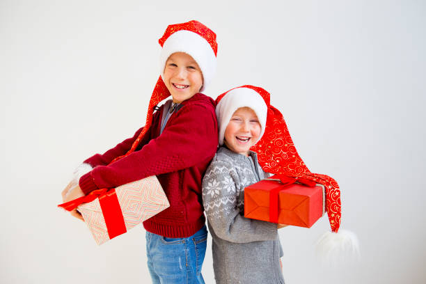 istock Kids celebrating christmas 884792652