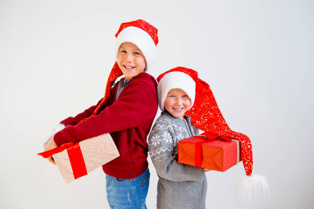 istock Kids celebrating christmas 884794874