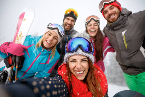 istock Group of young people taking selfie 884794936