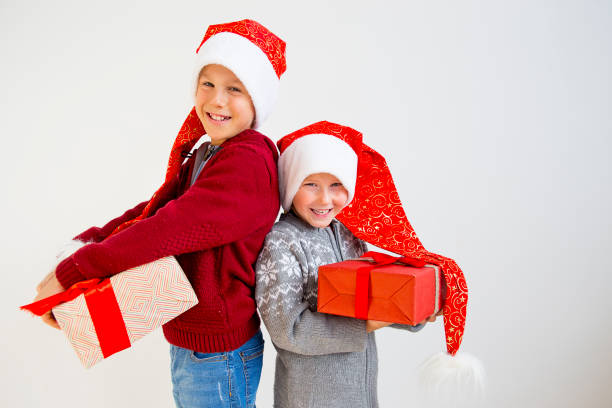 istock Kids celebrating christmas 884795050
