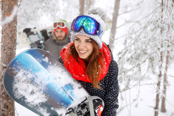 istock Young female snowboarder on winter 884795122