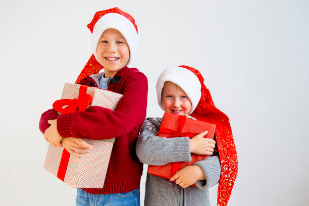 istock Kids celebrating christmas 884795184