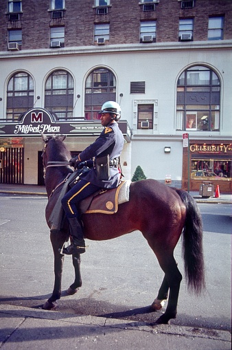 New York City, NY, USA, 1983. A mounted New York police officer on duty.
