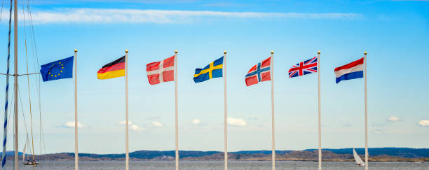 istock Seven European flags in a Swedish guest harbor 884798140