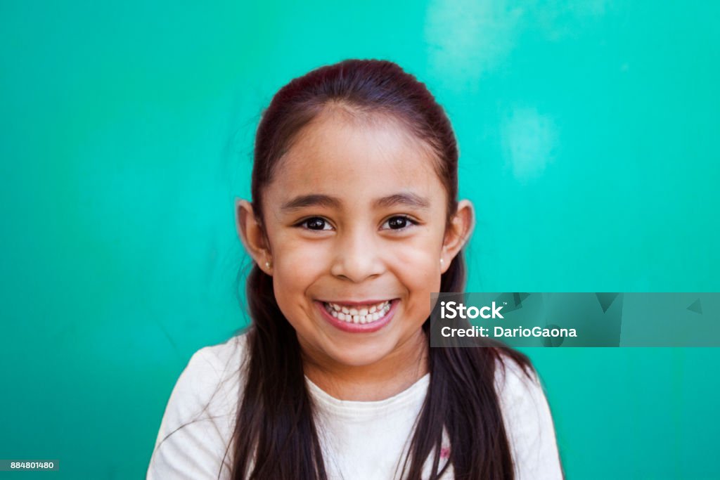 girl with a smiley face children with thoughtful faces Child Stock Photo