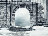 Ruined castle gate with snow