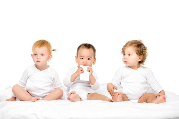 istock multicultural  toddlers with smartphone 884811656