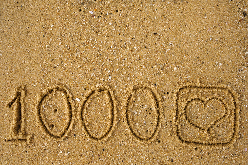 Love written on the sand. Copy Space.