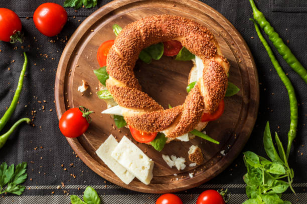 istock Fresh bagel sandwich on chopping board 884816374