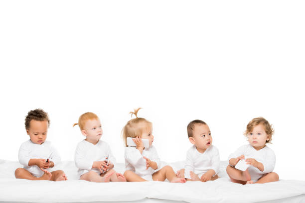 istock multicultural toddlers with smartphones 884816402