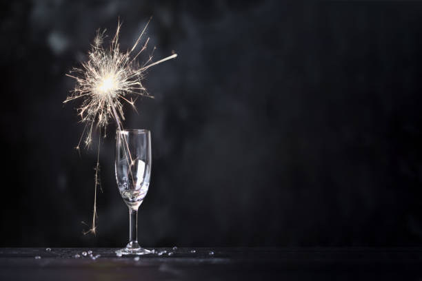 istock Champagne glass and sparkler 884833472