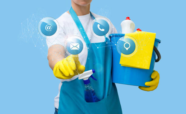 istock Cleaner clicks on the contacts icon . 884834154