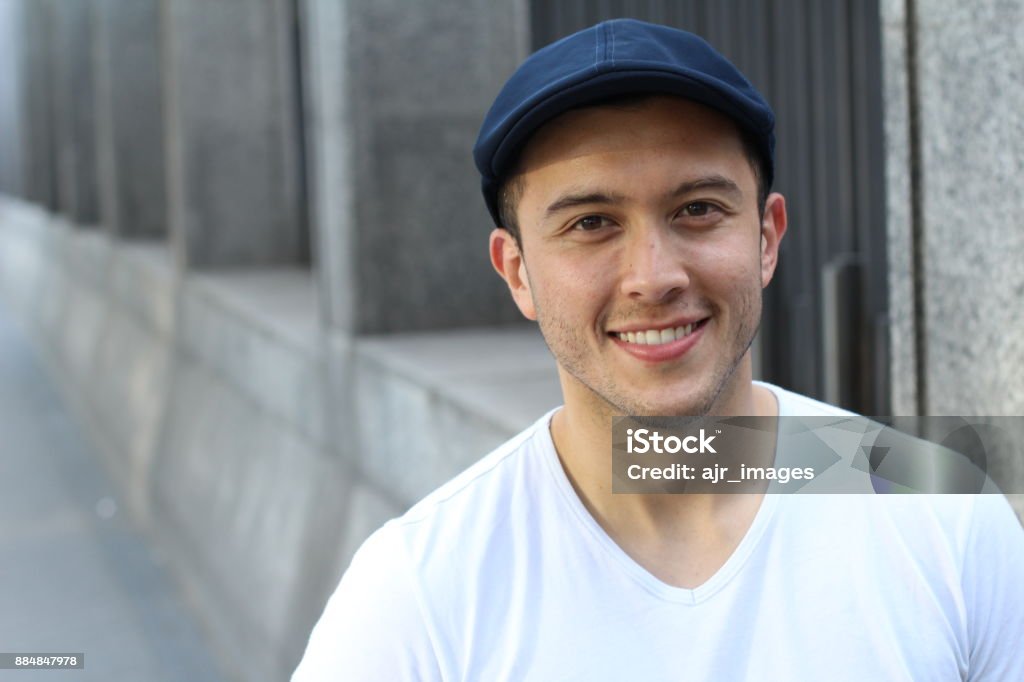 Ethnic stud smiling outdoors isolated with copyspace Ethnic stud smiling outdoors isolated with copy space. 1920-1929 Stock Photo