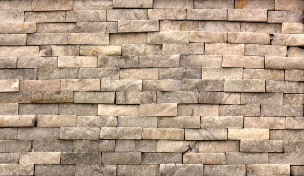 istock Marble texture decorative brick, wall tiles made of natural stone. Building materials. 884854900