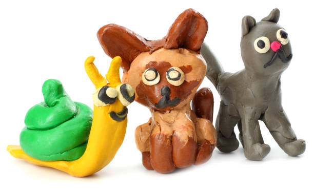 istock Kid's modelling clay cat isolated on white background 884855572