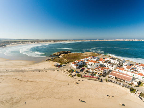 istock Village by the Atlantic Ocean Coastline 884887794