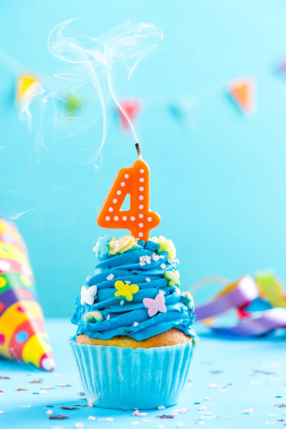 istock Fourth 4th birthday cupcake with candle blow out.Card mockup. 884888322