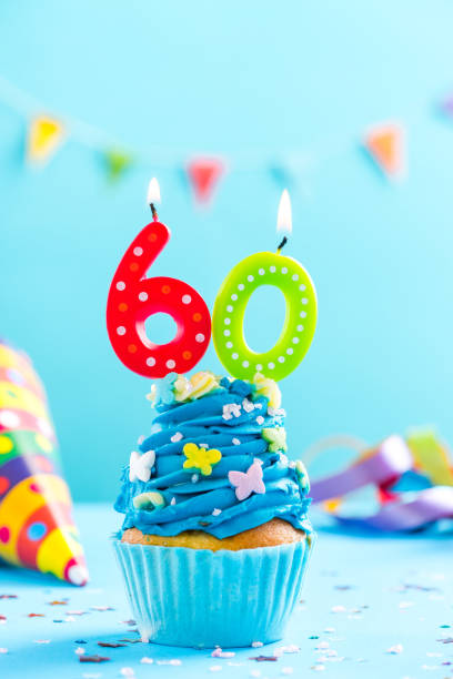istock Sixtieth 60th birthday cupcake with candle. Card mockup. 884894232