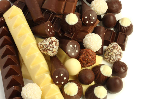 istock mix of chocolate candies sweets isolated on white background 884895270