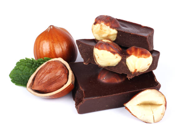 istock chocolate candies sweets with hazelnut isolated on white background 884900372