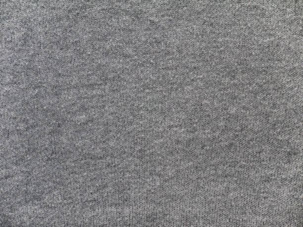 istock Heather gray cotton and viscose mix sweater knitted fabric texture 884902114