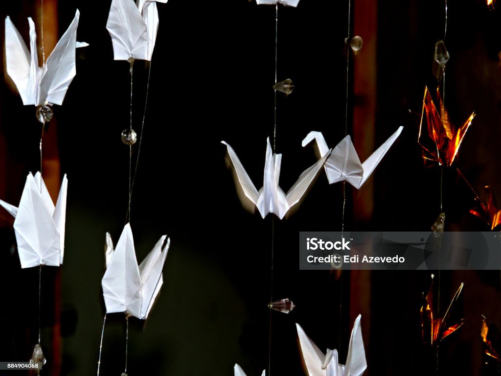 Origami curtain Tsuru Origami, Tsuru, Japanese culture, birds, folding with paper, pear, manual work. Paper Crane Stock Photo