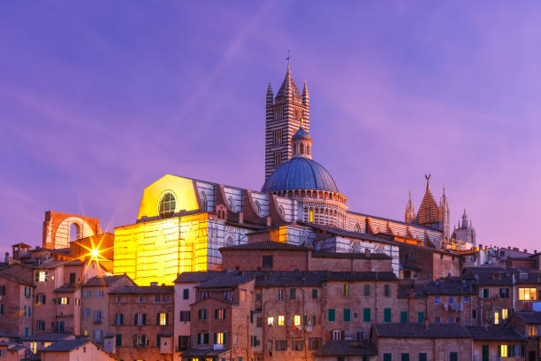 istock Siena Cathedral at night, Tuscany, Italy 884911678