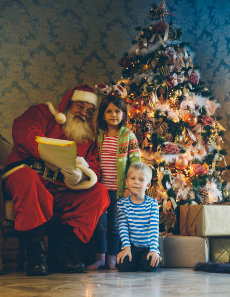 istock Santa reading fairy tales 884924288