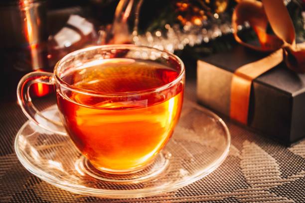 istock Cup of tea and gift box 884932616