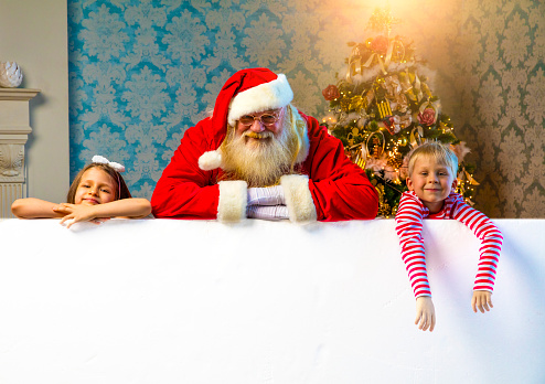 Santa and kids with blank empty white poster