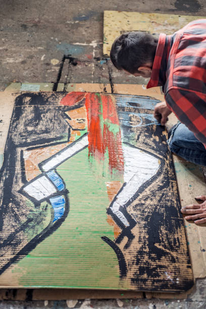 Artist Painting Canvas Cardboard On Floor