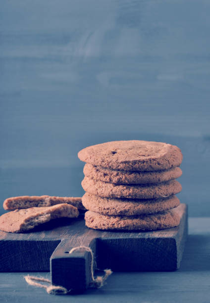istock oatmeal cookies on a wooden rustic Board 885002236