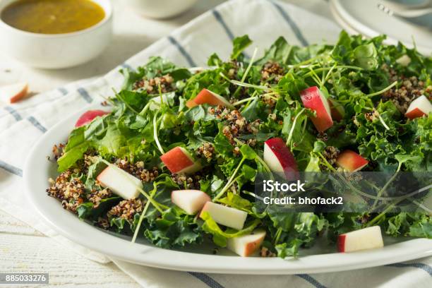 Raw Healthy Organic Kale And Apple Salad Stock Photo - Download Image Now - Apple - Fruit, Kale, Salad