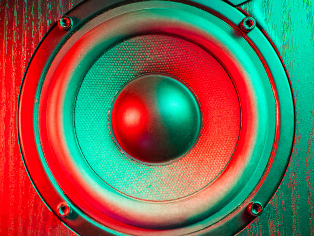 Close up details of loudspeaker woofer and tweeter driver. Colorful green and red led light Close up details of loudspeaker woofer and tweeter driver. Colorful led light. speaker of the house stock pictures, royalty-free photos & images
