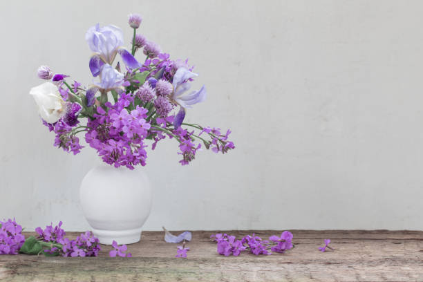 istock flowers in vase on background  white wall 885075010