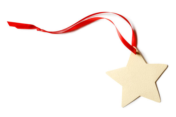 Blank, star-shaped Christmas gift tag isolated on white background. Simple, handmade, country style holiday decorations objects elements.