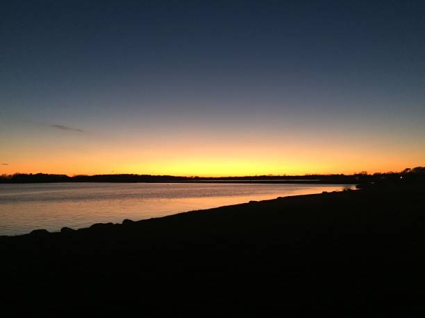 istock Causeway to Fenwick at sunset 885086266