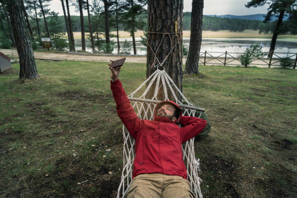 istock Mobile Phone User Selfie in Nature 885102156