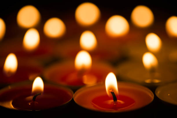 istock closeup to burning tealights 885137336