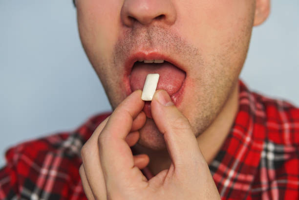 istock Young funny guy with chewing gum 885165766