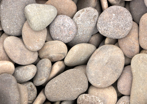 istock Polished colored marble pebbles and semi-precious stones background 885174950