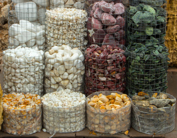 istock Polished colored marble pebbles and semi-precious stones background 885189388
