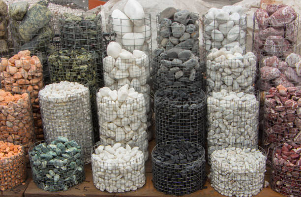 istock Polished colored marble pebbles and semi-precious stones background 885193976