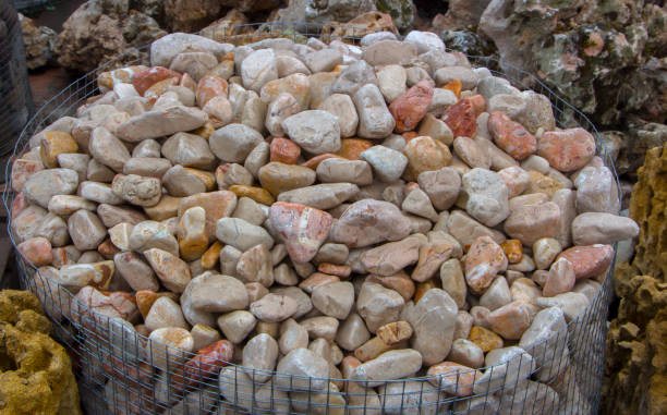istock Polished colored marble pebbles and semi-precious stones background 885194050
