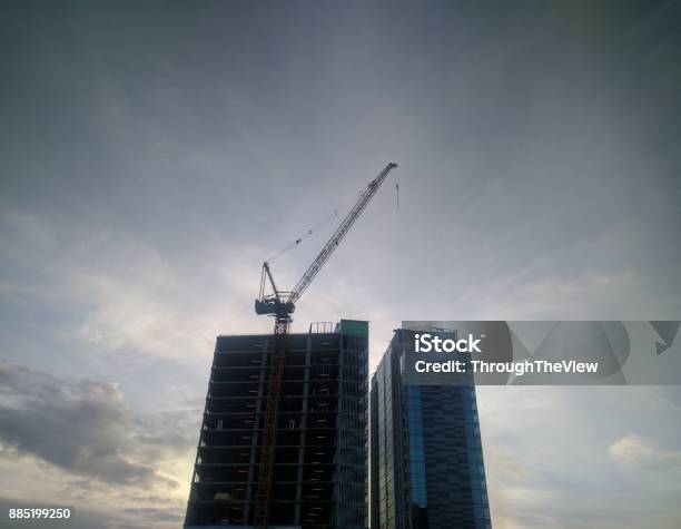 Crane Building Skyline Stock Photo - Download Image Now - Architecture, Building Exterior, Built Structure