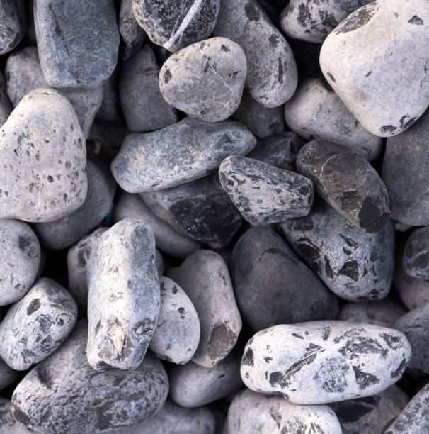 istock Polished colored marble pebbles and semi-precious stones background 885212656
